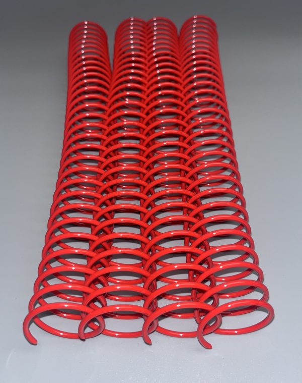 Two red spiral plastic coils, 1+1/4" x 12" in size, lay parallel on a gray surface.